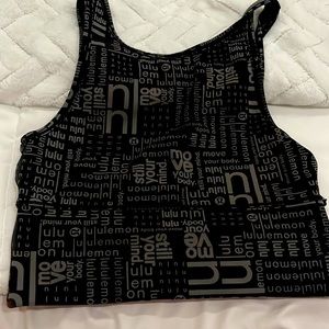 The brand is Lululemon and the size is 6 and the colour is gray and black